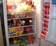 and an over full refrigerator